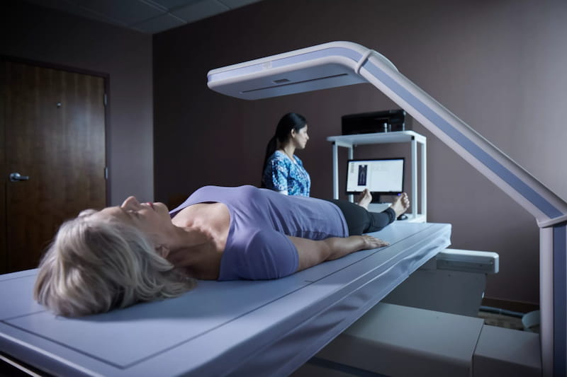 A customer undergoing a DEXA scan